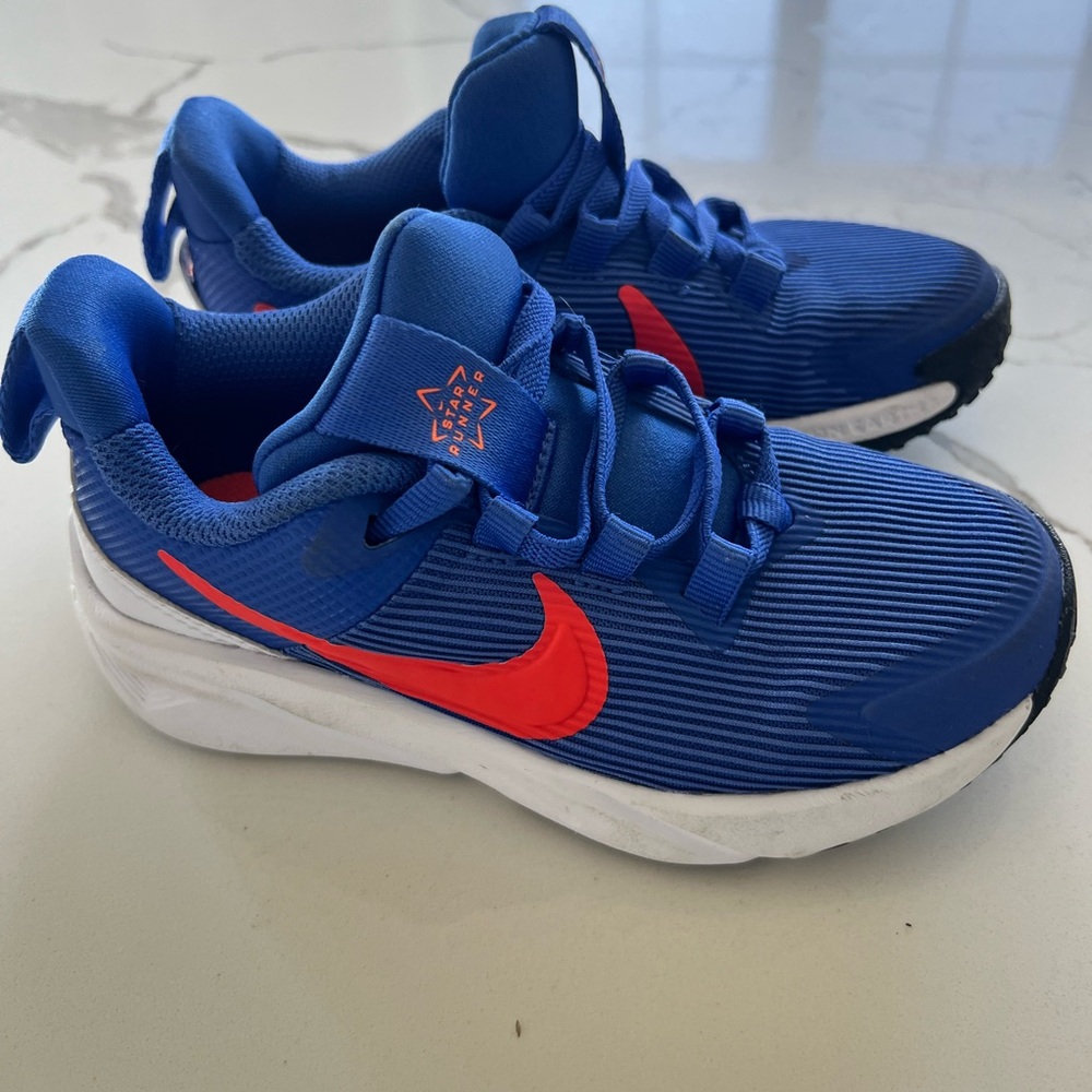 Toddler boys Nike Blue and Orange Athletic Shoes in size 11.  Brand New!!!